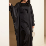 Beige satin 3-piece co-ord set for women, featuring a blouse, tailored pants, and a long belted robe, styled elegantly for formal wear