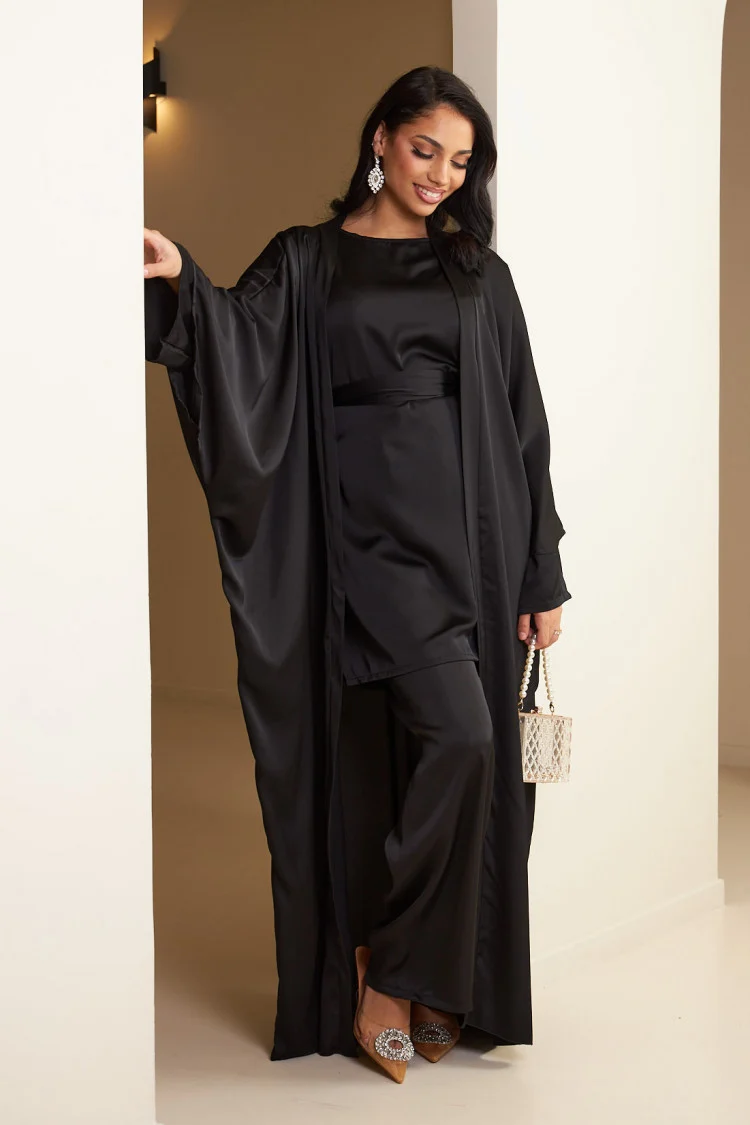 Beige satin 3-piece co-ord set for women, featuring a blouse, tailored pants, and a long belted robe, styled elegantly for formal wear